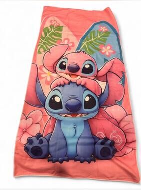 Stitch & Angel beach towel Stitch and Angel with tropical leaves and flowers